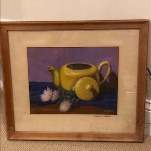 Framed photo of team pot and flowers